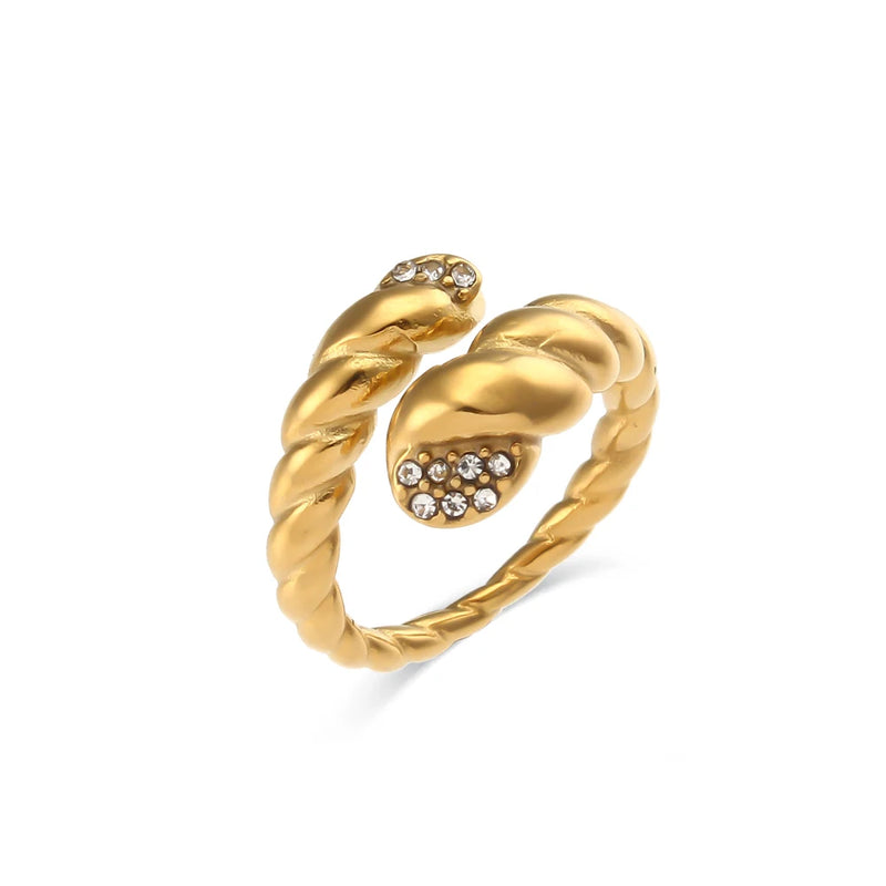 "Close-up of a ring with a twisted snake-style design, accented with sparkling cubic zirconia stones, radiating bold sophistication and edgy elegance."