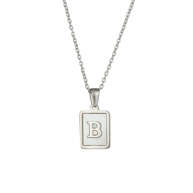 Introducing our Hypoallergenic 26 Letter Square Necklace Pendants in Silver Color, the perfect blend of style and personalization. Crafted with hypoallergenic materials, these pendants are ideal for those with sensitive skin. With each pendant featuring a unique letter design, you can create a personalized statement piece that adds a touch of elegance to any outfit.