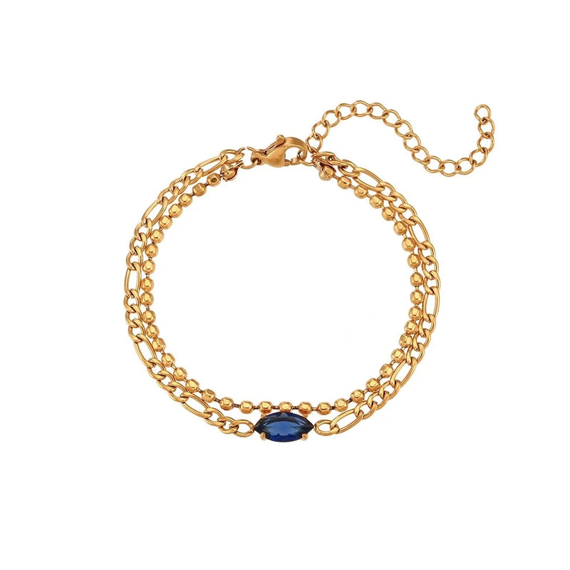 Elevate your wrist game with our Stainless Steel PVD Coating Zircon Double Layer Bead Chain Bracelet designed for women. Crafted with precision and coated with a durable PVD finish, this bracelet offers a luxurious touch with its black, blue, pink, or red zircon accents. Whether worn solo or stacked, this chic accessory adds a bold yet elegant statement to any ensemble.