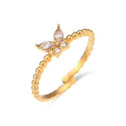 "Close-up of an adjustable ring with a cubic zirconia butterfly design available in various colors, offering a whimsical and elegant touch to any outfit."