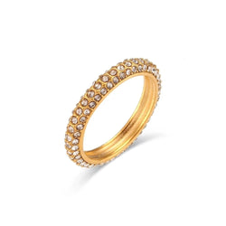 "Close-up of a ring studded in tiny crystals, exuding delicate elegance and shimmering brilliance."