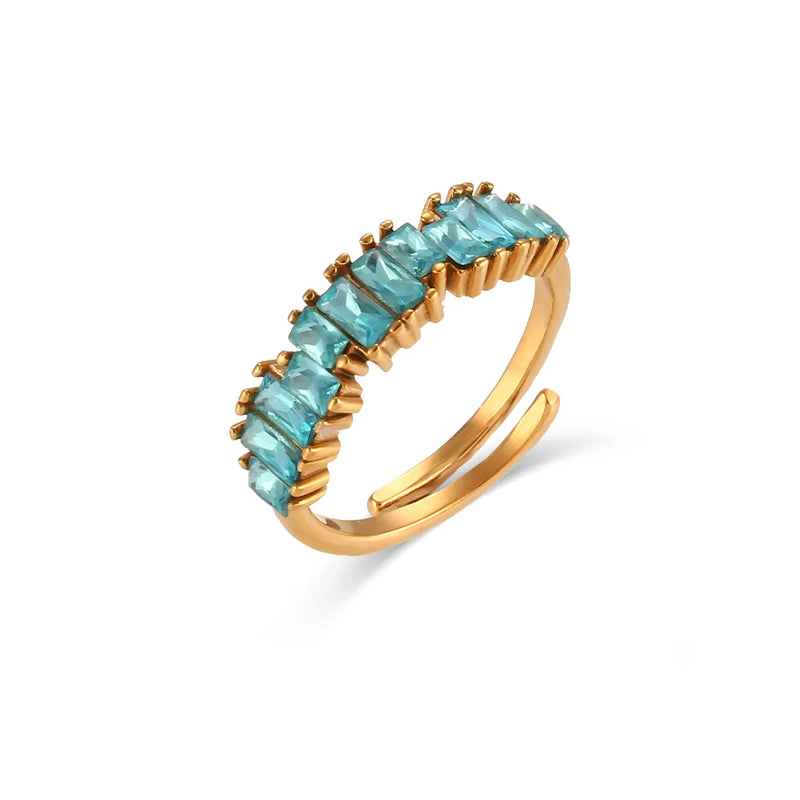 "Close-up of an adjustable ring with a cluster of baguette-cut cubic zirconia stones, available in various colors, offering versatile elegance and sparkle."