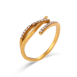 "Close-up of an adjustable ring with a branch crossover design encrusted in cubic zirconia stones, evoking the beauty of nature with intricate detail."